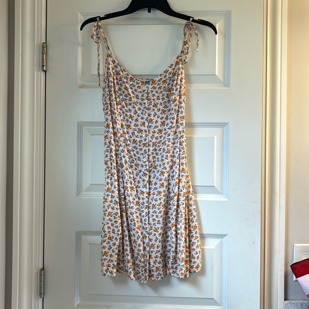 Rhythm summer mini dress with floral print.